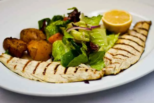 Branzino fillet — grilled whole, lemon, herbs