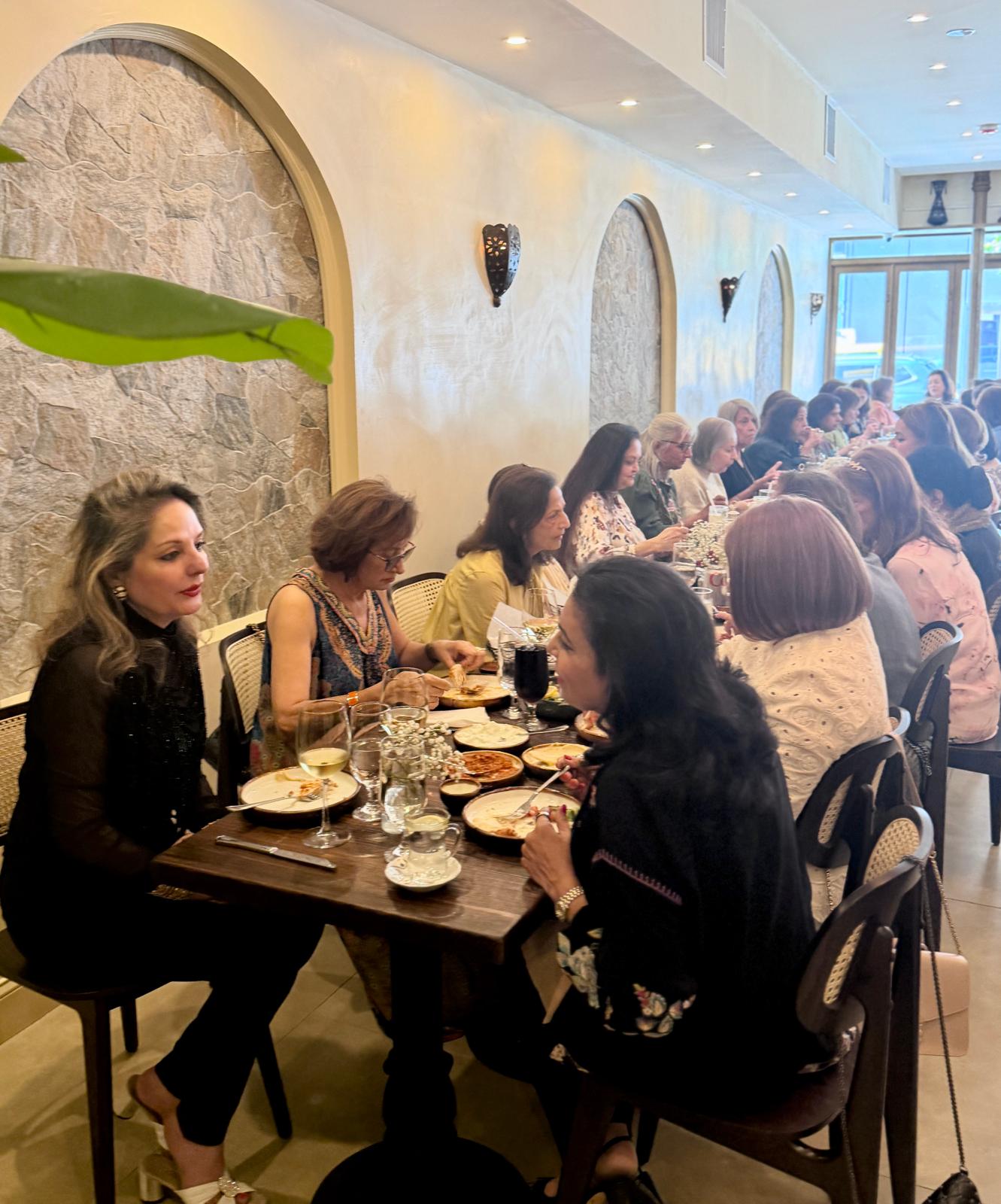 Dining room — ladies' luncheon under the arched niches